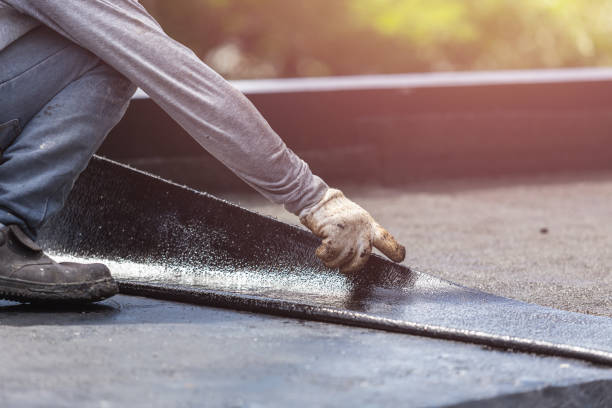 Professional Basement Waterproofing technician working in Kansas, OH